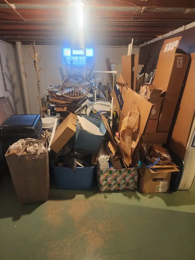 Roll-off dumpster container at job site for 8 Yard Dumpster Rental in Coon Rapids